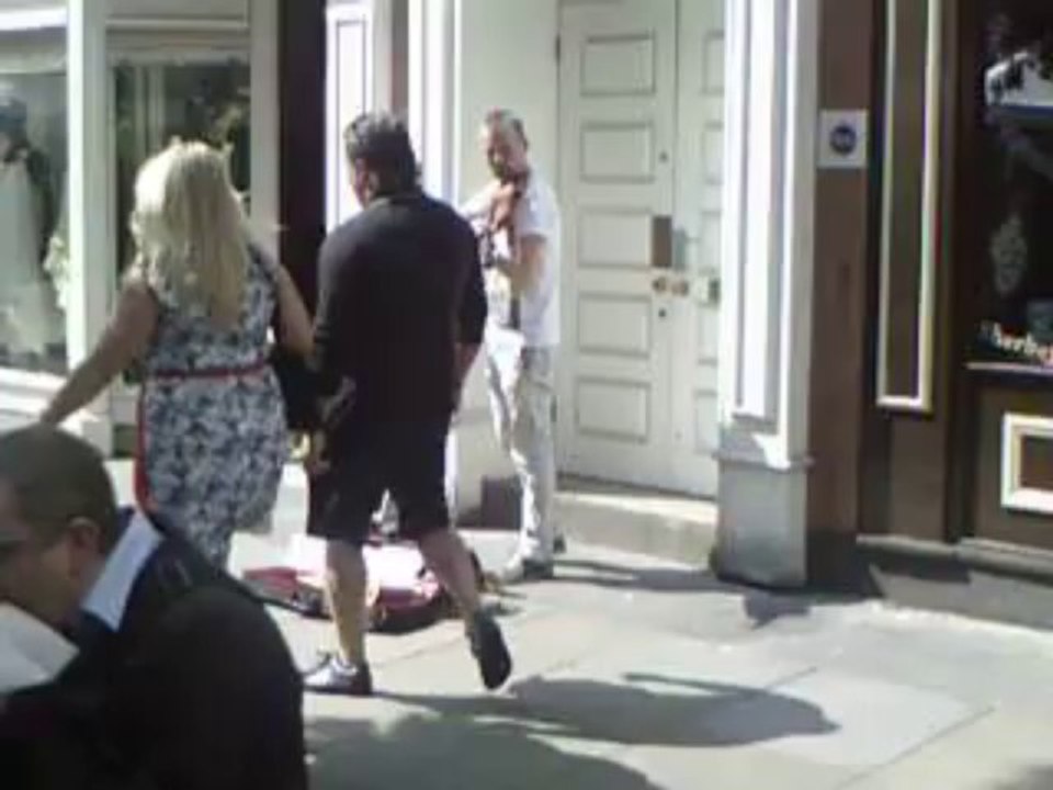street musician at saint annes square manchester uk