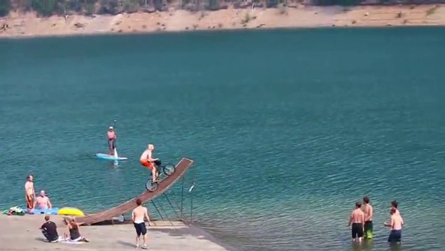 Biggest bicycle jump into a lake!! Great GoPro Video!!