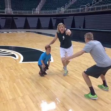 Looking for a Basket-Ball?? Play with a dwarf!! Michigan state basket-ball Team!