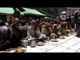 Saints gather outside Gangotri temple for holy food distribution