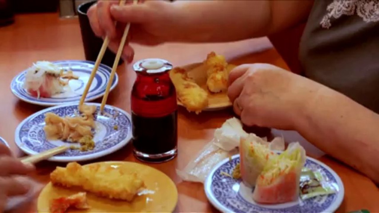 Sushi-go-round -- Japan tradition served with t...