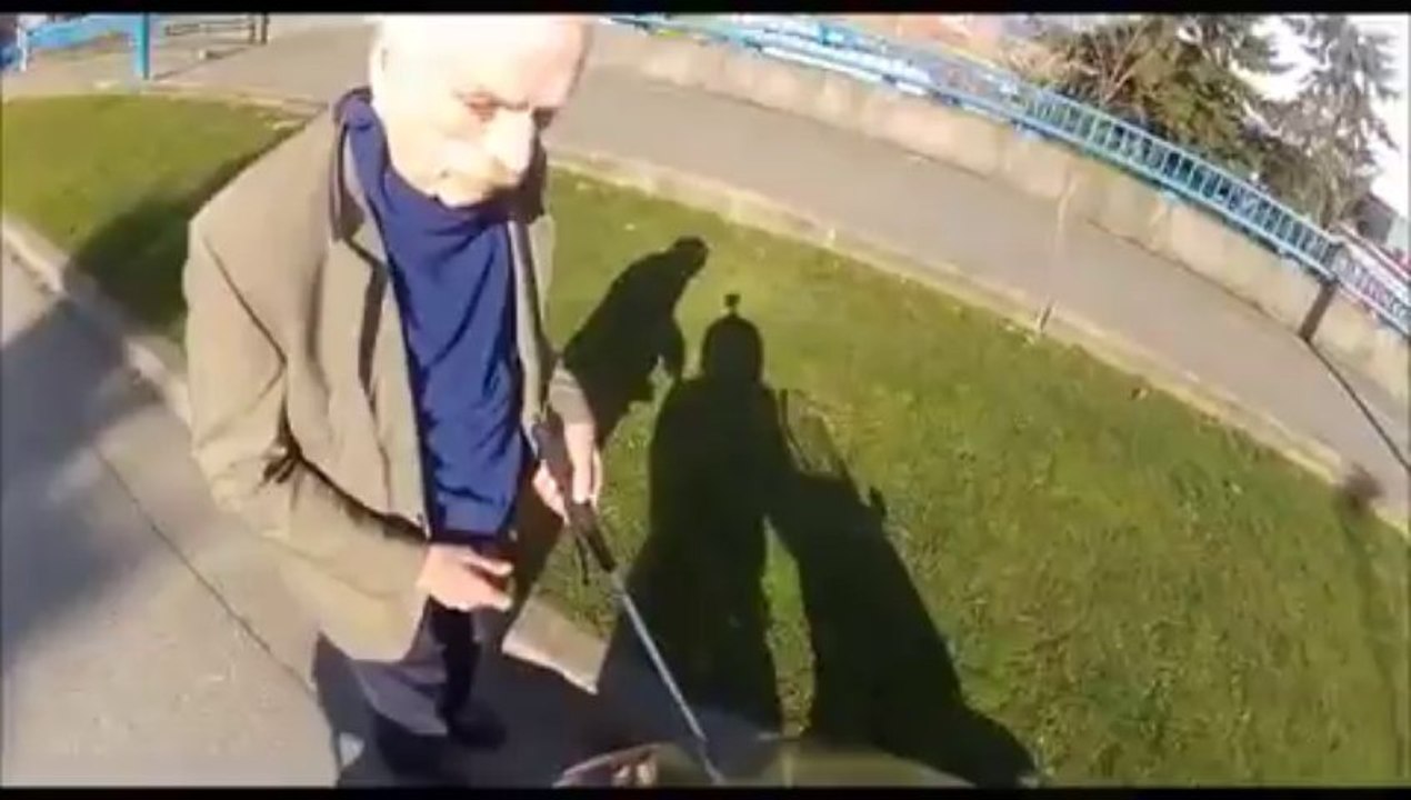 Blind man in the road On motorcycle ride. Scooter pulls over and helps him