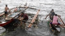 Typhoon Utor batters northern Philippines