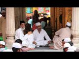 Muslim devotees waiting for Iftar at Delhi's Nizamuddin Dargah