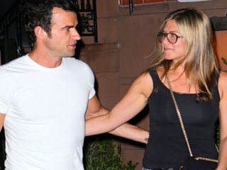Jennifer Aniston shrugs off pregnancy rumors