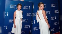 Amber Heard Flaunts Her Midriff in a Slashed White Ensemble at Star-Studded Luncheon