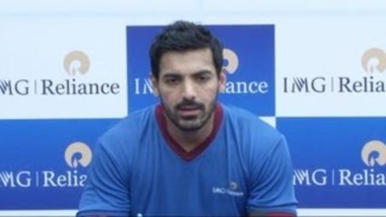 John Abraham Visits the Football Training Camp