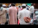 Muslim devotees performing Namaz at the shrine of Hazrat Nizamuddin