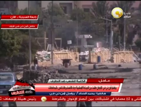الإخوان يلقون مدرعة شرطة من أعلى كوبري أكتوبر ويحطمون أسوار الكوبري