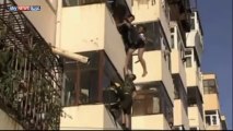 Woman saved from a 5th floor balcony fall!!