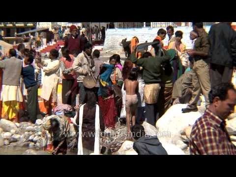 Women dance in trance to the beat of drums at Gangotri idol migration