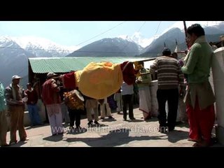 Devotees bring out the Palaquin of Goddess Ganga and performs ritualistic dances