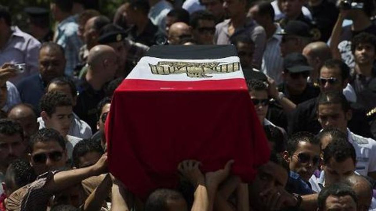 Egyptian security forces clear pro-Morsi sit-ins