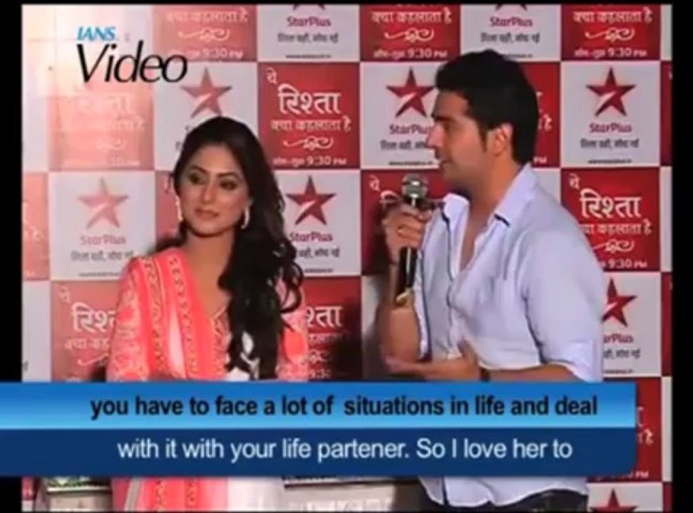 Doting husband Karan