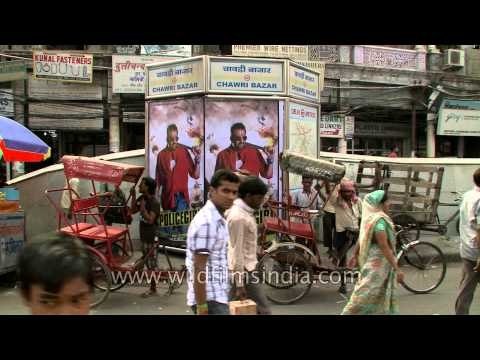 Rickshaw-pullers waiting for passenger outside Chawri Bazar metro station