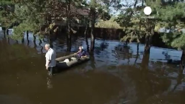 Thousands flee homes after floods hit eastern Russia