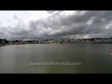 Stunning monsoon clouds in time lapse over Pushkar lake
