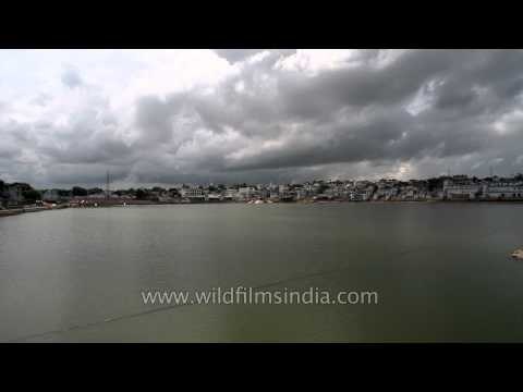 Stunning monsoon clouds in time lapse over Pushkar lake