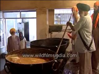1039.People making sweets at Golden Temple
