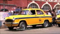 1795. Howrah Railway Station and Yellow Kolkata cab