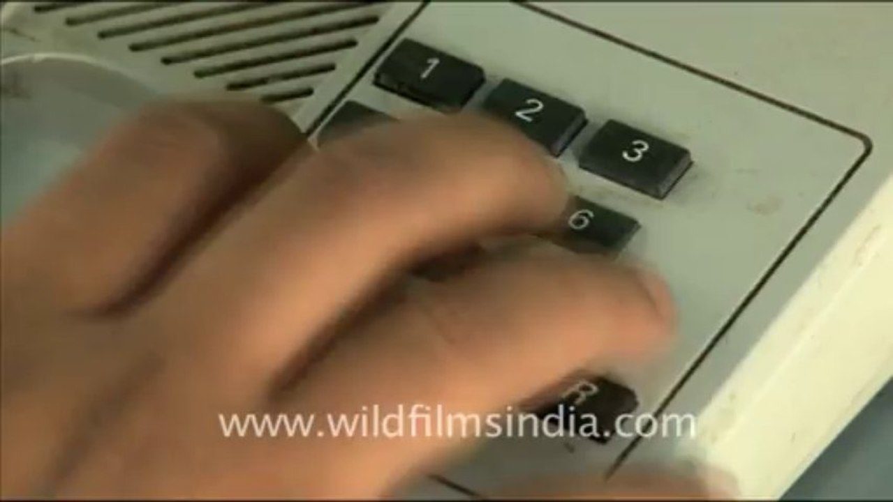 1856.Push button telephone being used in India
