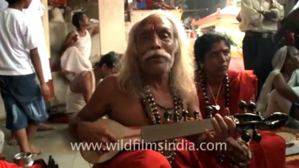 2316.Old baba singing a regional song in Ambubachi mela