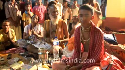 2328.Old baba playing Dhapli