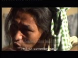 Tibetan cutting arm of man off with a knife-MPEG-4 800Kbps