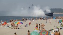 Russian Navy Hovercraft Lands On Busy Beach