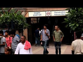 Passengers coming out from Ramakrishna Ashram Marg metro station