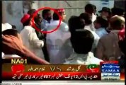 Spanking of PTI worker by ANP leader Haroon Bilour and his guard in NA-1 Peshawar