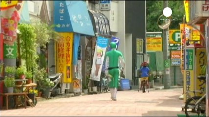Masked superhero to the rescue at Tokyo subway station