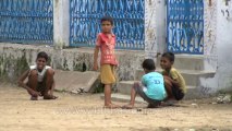 Children playing in a Village temple: Sonkhaliya village in Rajasthan