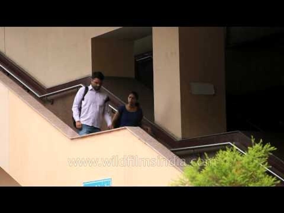 Passengers exiting from the exit gate at Karol Bagh metro station