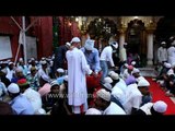 Muslim throng performing Iftar at Nizamuddin Dargah