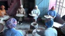 Mizoram-largest family-Women sieving rice-1
