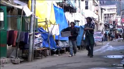 Boy selling bread and washing utensils