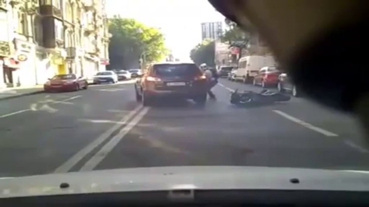 Motorcycle accident. The driver hit a car door while it was open.