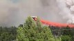 Plane drops retardant on Rim Fire