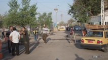Iraqis clear streets after Baghdad cafe suicide bomber kills 25