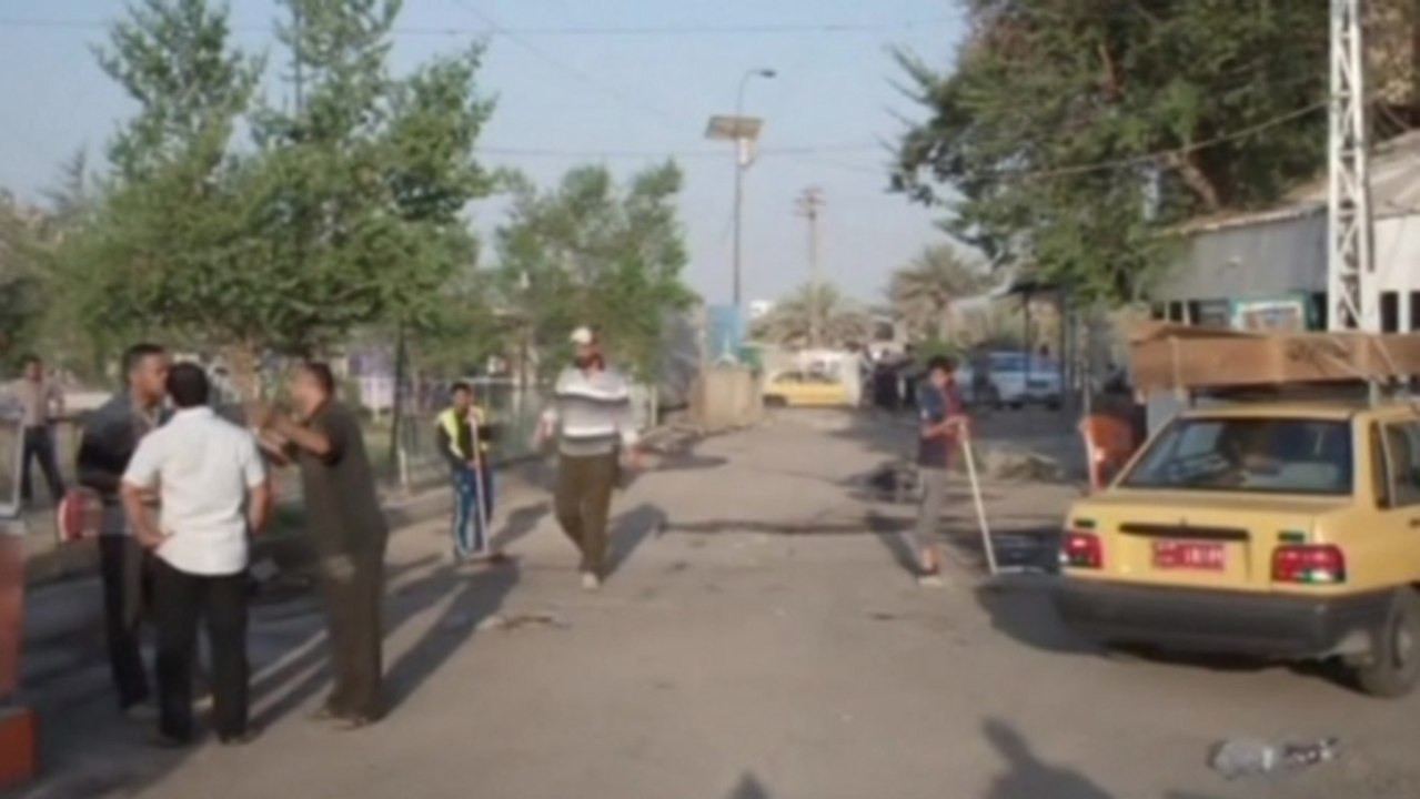 Iraqis clear streets after Baghdad cafe suicide bomber kills 25