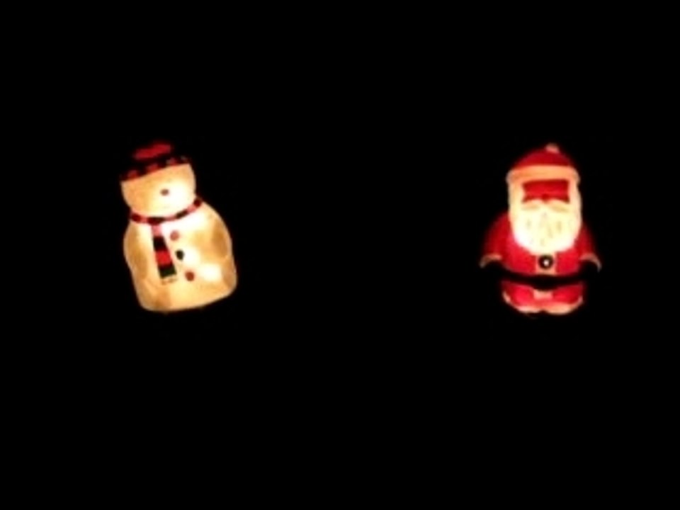 Frosty Snowman and Santa Claus - night