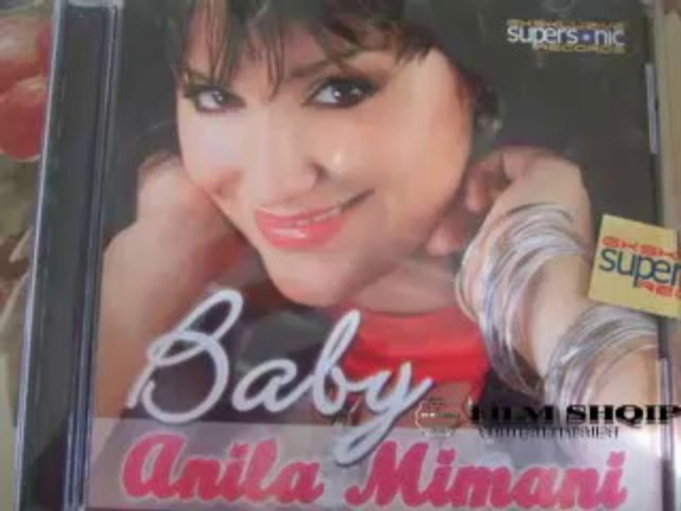 8.Anila Mimani - Njeri zeshkan,tjetri bjond