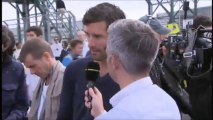 Mark Webber being interviewed on the MotoGP grid at the 2013 British Grand Prix