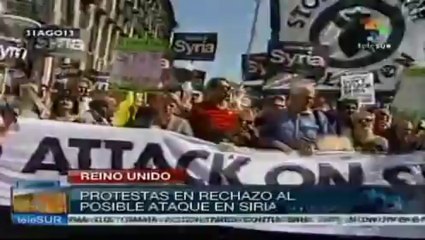 Marchan ingleses para celebrar que no atacarán Siria