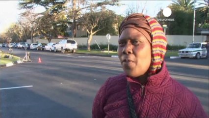 Mandela back home but still in critical condition