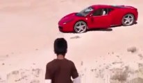 A kid drives a Ferrari and make some Drifts in Libya!