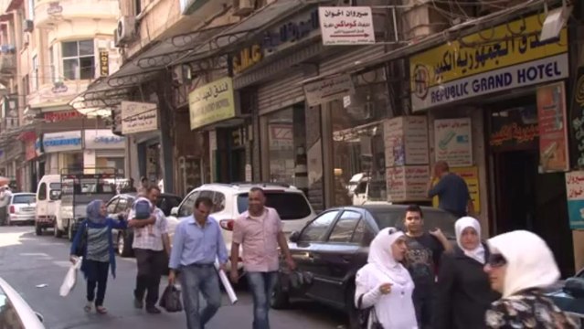 Damascus hotels host fleeing families, not tourists