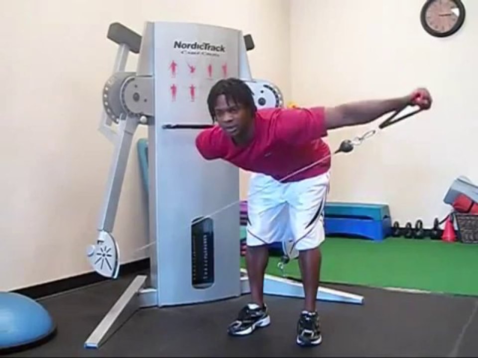 Julian Brown Pro Natural Bodybuilder demonstrates a single arm bent cable raise