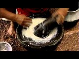 Traditional process of rice grinding